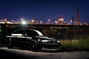 B M W E46 Nighttime Urban Backdrop Wallpaper