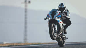 B M W S1000 R R Wheelie Action Wallpaper