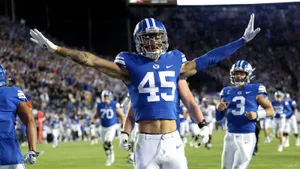 B Y U Football Player Celebration Wallpaper