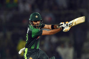 Babar Azam In Batting Action Wallpaper