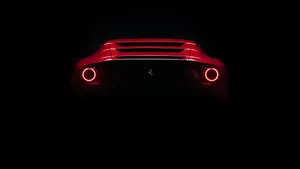 Back View Of A Red Supercar Wallpaper