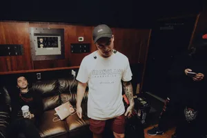 Backstage Band Members Relaxing Wallpaper