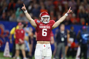 Baker Mayfield Celebrating Touch Down Wallpaper