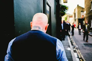 Bald Man Tattooed Head Urban Street Wallpaper