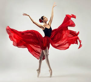 Ballet Dancer In Stunning Dress Wallpaper