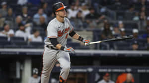 Baltimore Orioles Player Swinging Bat Wallpaper