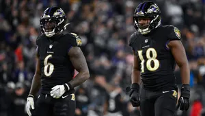 Baltimore Ravens Linebackers On Field Wallpaper