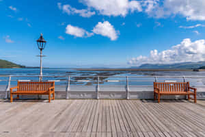 Bangor Pier Viewwith Benches Wallpaper