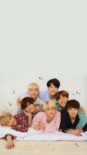 Bangtan Sonyeondan Group Photo In A Cityscape Wallpaper