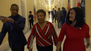 Barbara Lee Walking Along Hallway Wallpaper