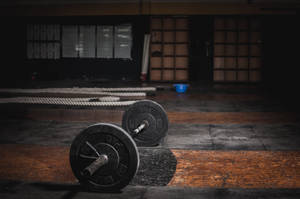 Barbell On Old Cement Floor Wallpaper