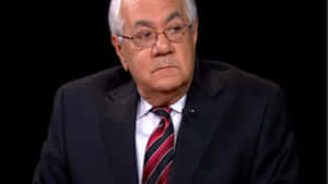 Barney Frank With A Stern Expression Wallpaper