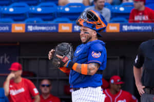 Baseball Catcher Smiling During Game Wallpaper