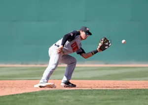 Baseball Infielder Fielding Ball.jpg Wallpaper