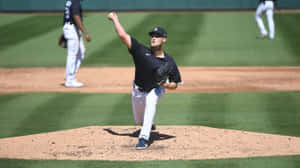 Baseball Pitcher In Action.jpg Wallpaper