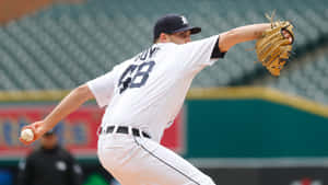 Baseball Pitcher In Action Wallpaper