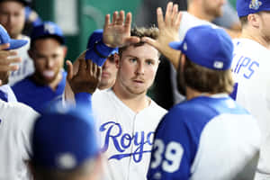 Baseball Player Celebratingwith Team Wallpaper