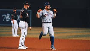 Baseball Player Celebration Moment.jpg Wallpaper