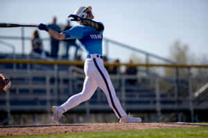 Baseball Player Hitting Ball During Game.jpg Wallpaper