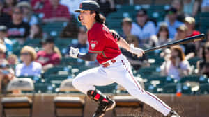 Baseball Player Hitting Ball Dynamic Swing Wallpaper