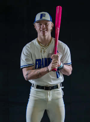 Baseball Player Portraitwith Pink Bat Wallpaper