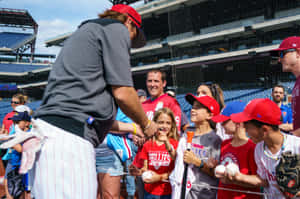 Baseball Player Signing Autographsfor Fans Wallpaper