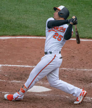 Baseball Player Swinging Bat Wallpaper