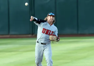 Baseball Player Throwing Ball During Game.jpg Wallpaper