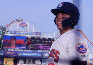 Baseball_ Player_with_ Amusement_ Park_ Background Wallpaper