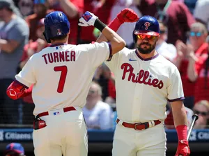 Baseball Players Celebrating Team Spirit Wallpaper