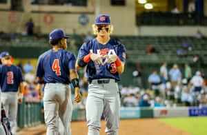 Baseball Players Celebrating Victory Wallpaper