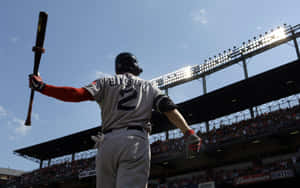 Baseball Players Competing In An Intense Game Wallpaper