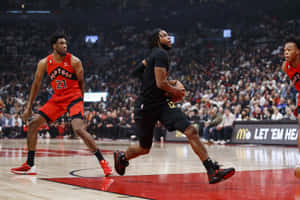 Basketball Action Darius Garlandvs Raptors Wallpaper