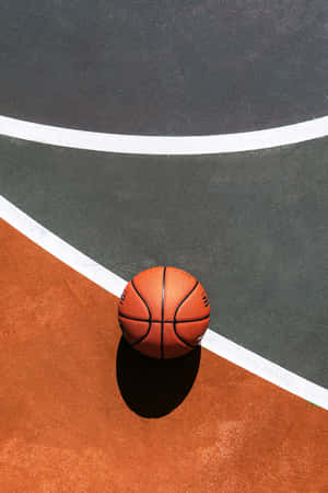 Basketball Aesthetic Ball On Court Floor Wallpaper