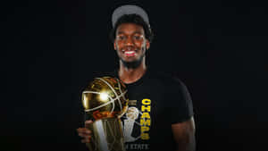 Basketball Champion Holding Trophy Wallpaper