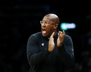 Basketball Coach Expressive Gesture Wallpaper