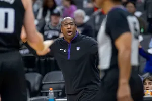 Basketball Coach Mike Brown Gesturing During Game Wallpaper