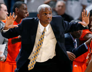 Basketball Coach Strategic Gesture Wallpaper