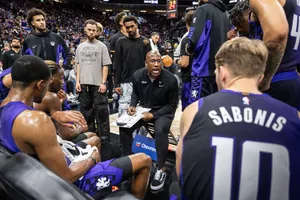 Basketball Coach Strategy Discussion Wallpaper