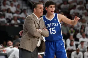 Basketball Coachand Player Discussion Wallpaper