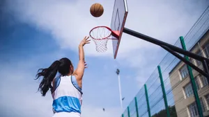 Basketball Girl Shooting Hoop Outdoor Court.jpg Wallpaper