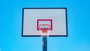 Basketball Hoop Against Blue Sky Wallpaper