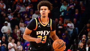 Basketball Player Action Shot Wallpaper