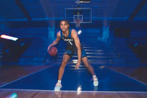 Basketball Player Action Shot Wallpaper