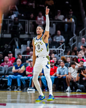 Basketball Player Celebratingon Court.jpg Wallpaper