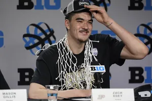 Basketball Player Celebrationwith Net Accessory Wallpaper