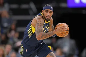 Basketball Player Concentration During Game Wallpaper