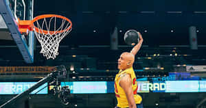 Basketball Player Dunking Action Wallpaper