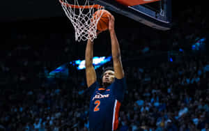 Basketball Player Dunking Action Wallpaper