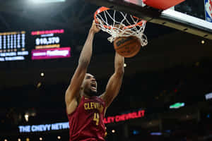 Basketball Player Dunking During Game.jpg Wallpaper